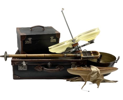 Early 20th century bamboo shooting stick, two matching black and brown leather suitcases, model boat, Art Deco style chrome a