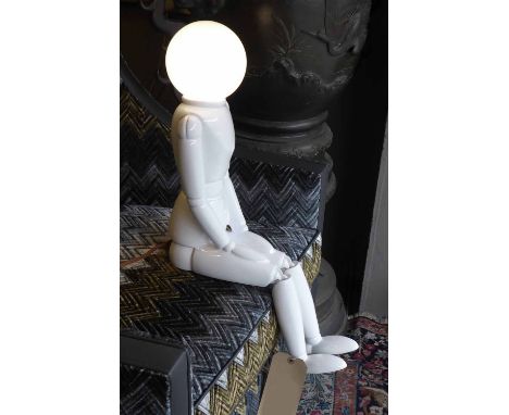 FIGURAL LAMP, purchased from Alex valentine Atelier Kings Road, seated porcelain figure with illuminated bulb head, 60cm H.