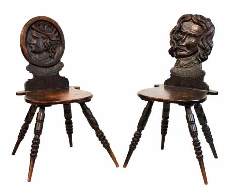 HALL CHAIRS, a matched pair, 19th century Anja Swiss oak with portrait carved backs on turned splayed supports. (2)