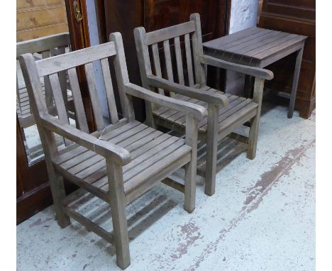 GARDEN ARMCHAIRS, a pair, weathered teak of substantial construction by Westminster together with a garden table, 76cm x 50cm