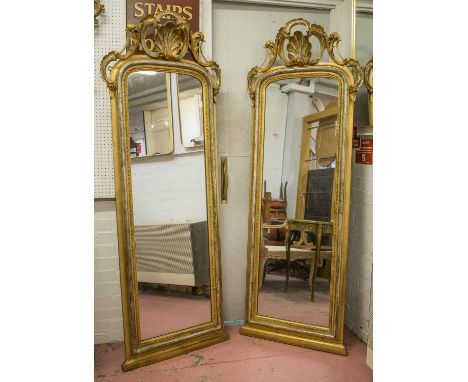 PIER MIRRORS, a pair, 19th century gilt, silveredwood and gesso, circa 1860 with arched plates surmounted by shell and scroll