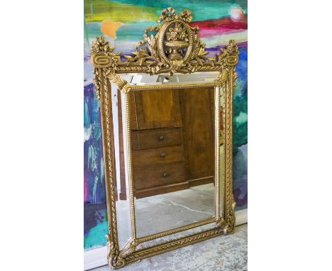 WALL MIRROR, Louis XVI style gilt composition with wreath and urn crest, cushion bevelled rectangular and marginal plates, 14