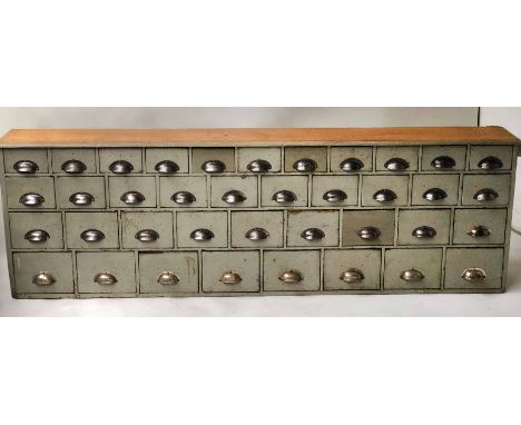 BANK OF DRAWERS, early 20th century vintage English grey painted with thirty eight short drawers, 205cm W x 27cm D x 67cm H. 
