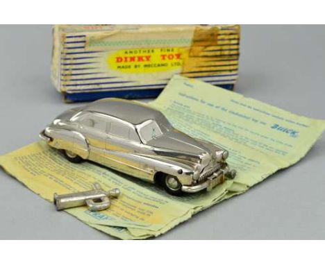 A PRAMETA BUICK 405 CLOCKWORK STEERABLE CAR, chrome plated model, not tested, complete with traffic policeman key and (damage