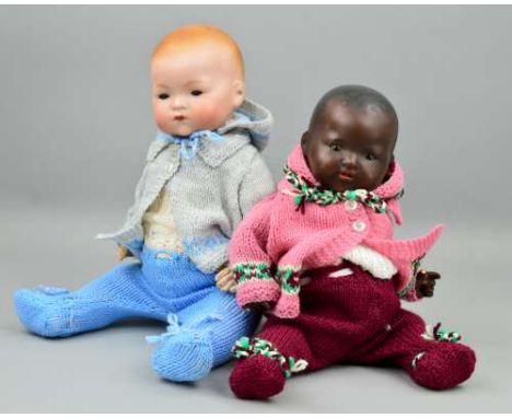 TWO ARMAND MARSEILLE BISQUE HEAD BABY DOLLS, one nape of neck marked 'A.M Germany 351/3 1/2 K', sleeping eyes, open mouth sho