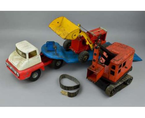 A TRI-ANG PRESSED STEEL FORD THAMES TRADER ARTICULATED LOW LOADER WITH HIGH LIFT LOADER SHOVEL, 1st type grille, version with