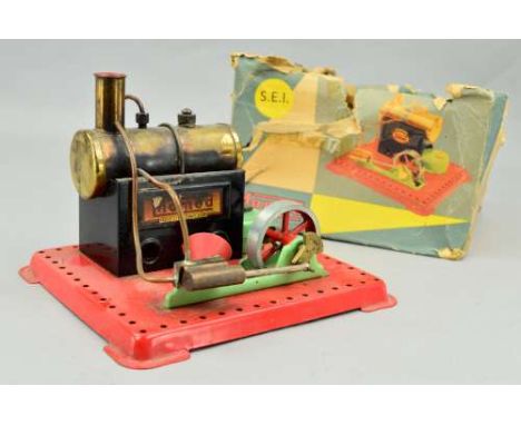 A MAMOD LIVE STEAM ENGINE, No.SE1, not tested but appears largely complete, with burner and funnel, contained in remains of o