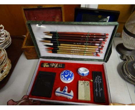 A Chinese cased artist's painting box, small inlaid tea caddy & another decorated box