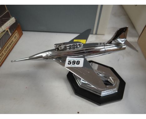 A desk table lighter in the form of a jet plane