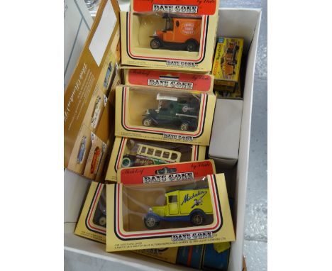 A small collection of Days Gone By vintage model cars together with several matchbox cars from the 1970s in boxes
