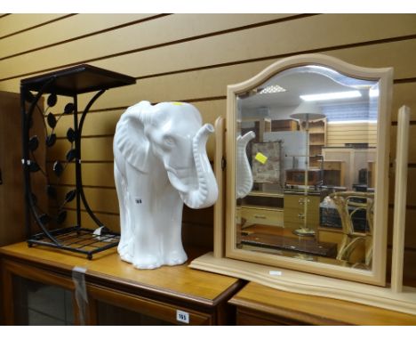 A large white ceramic elephant plant holder together with a metal stand & a small modern dressing table mirror