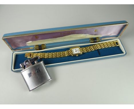 A Sekonda ladies wristwatch together with a small lighter