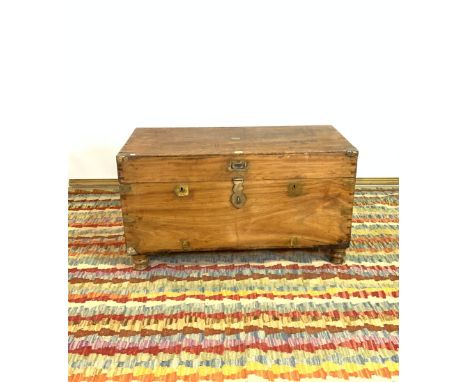 A LATE 19TH CENTURY BRASS BOUND TEAK TRUNK94cm wide; 52cm high