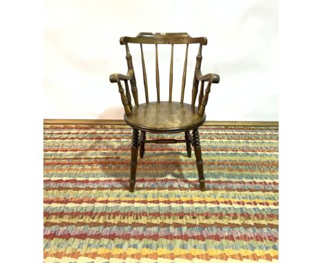 A 19TH CENTURY STAINED BEECH STICK BACK ARMCHAIR59cm wide; 89cm high