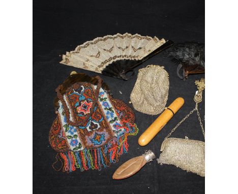 A collection of Victorian and vintage handbags to include a beaded example, another stamped "Sterling", two fans and a wooden