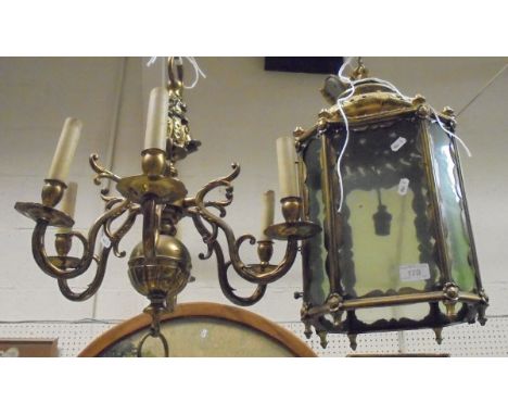 A brass and glazed ceiling lantern in the Middle Eastern style, together with a Dutch style brass six branch electrolier