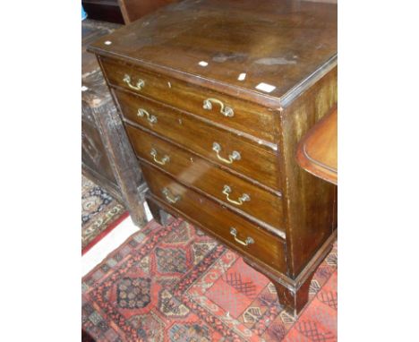 A 19th Century mahogany chest of four long graduated drawers to bracket feet
