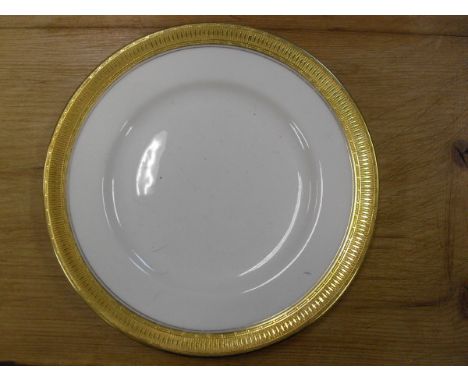 A Royal Worcester "Curzon" pattern part dinner service and a Royal Crown Derby ivy and flower decorated part tea service 