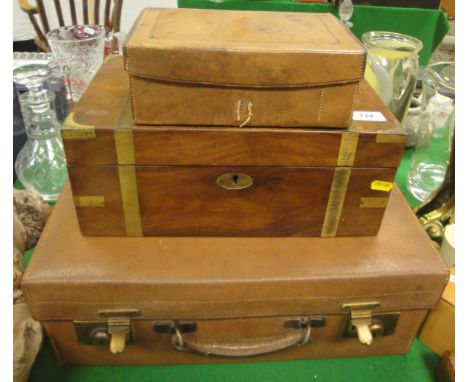 An Army and Navy pigskin vanity case containing various brushes, together with a small leather case containing various postca