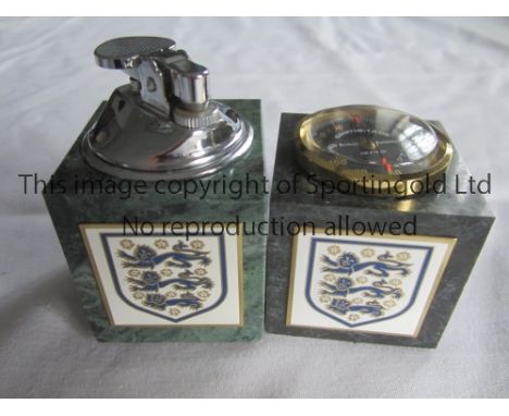 FOOTBALL GIFTS     Two Football Association gifts: a lighter and a barometer.     Generally good