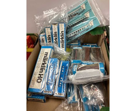 Marklin HO gauge rolling stock, coaches, lineside accessories, track etc, boxed, (30).