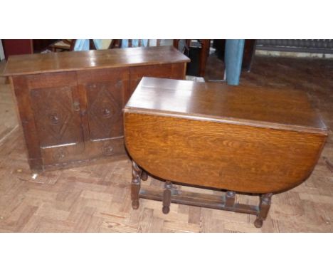 Early 20th century oak gate-leg table on barley-twist legs and oak Jacobean style three door dresser base. Condition reports 