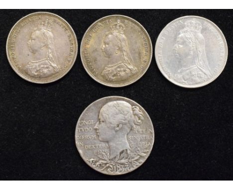 Three Queen Victoria Shillings to include two small Jubilee head l. R. Crowned shield in Garter, 1887 and 1888, edge milled, 