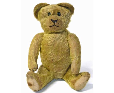 Mid 20th century teddy bear with movable limbs and button eyes, 44cm long. Condition reports are not available for the Interi