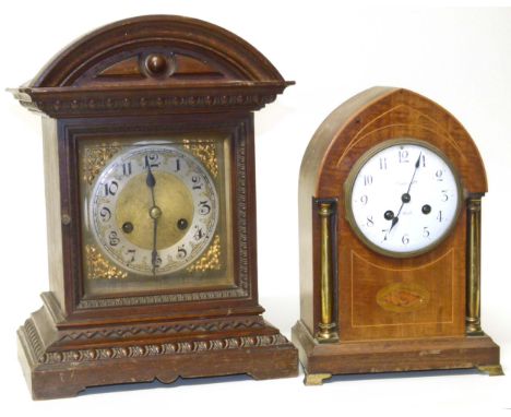 Mahogany lancet clock and an oak mantel clock. Condition reports are not available for the Interiors Sale.