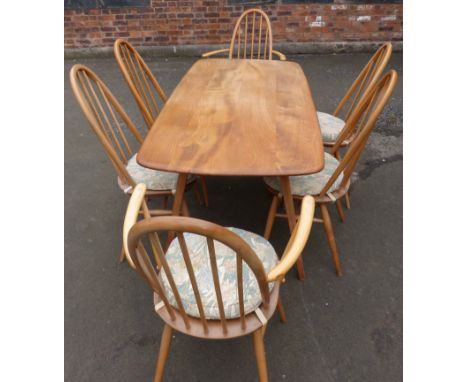 Set of six "Windsor Quaker" dining chairs (2 carvers) and table, 152 x 75cm by Ercol. Condition reports are not available for