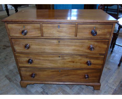 19th century mahogany chest of three short and three long drawers on bracket feet, 114cm wide. Condition reports are not avai