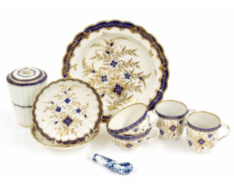 Worcester porcelain part tea service, late 18th century, painted with blue and gilded floral sprays within lobed fluted borde