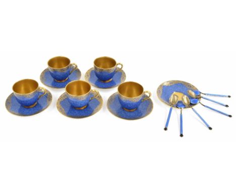 Royal Worcester demi-tasse cabinet cups and saucers, with mottled blue ground and gilt rim decoration and interior, Viking sh