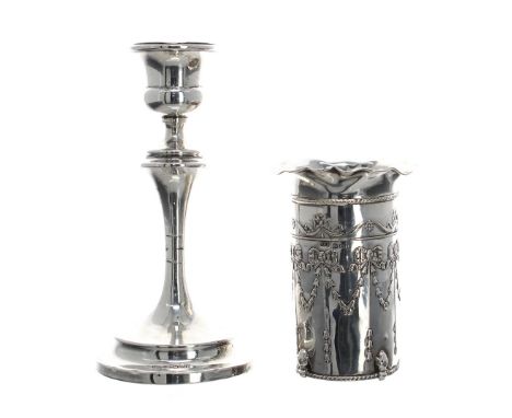 George V silver vase sleeve (lacking glass liner) with flared rim and decorated with repousse harebell garlands and bows arou