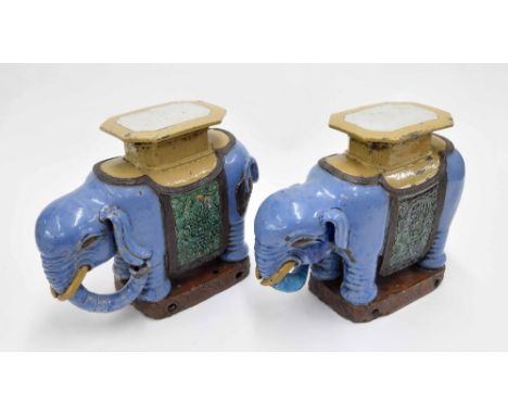 Pair of Chinese stoneware elephant form garden seats, 19th century, 20.5" high (one trunk restored) 