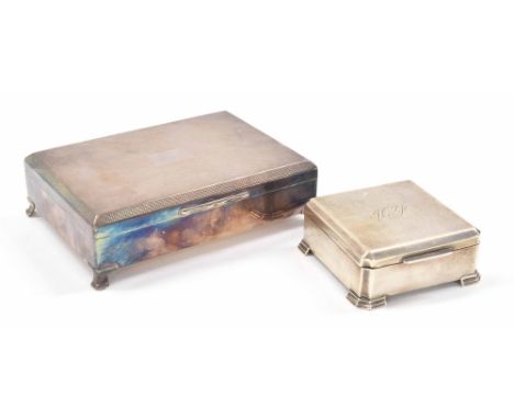 White metal square trinket box, plush lined with blue velvet, 3.5" wide; together with a silver plated cigarette box with eng