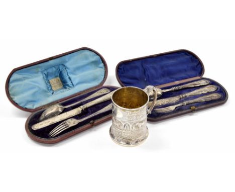 Scottish 19th century silver christening mug, with a gilt interior decorated in relief with a central band of animals within 