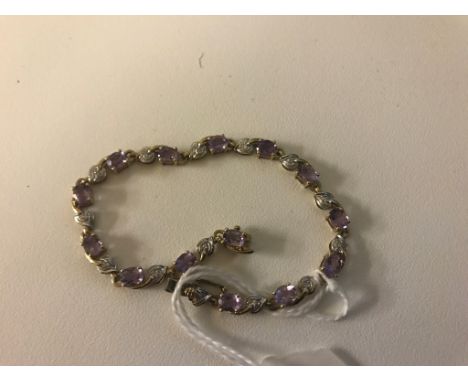 A 9ct diamond and amethyst bracelet