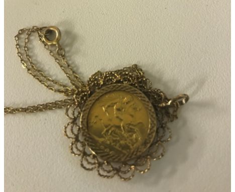 A 1906 half sovereign pendant on a gold chain