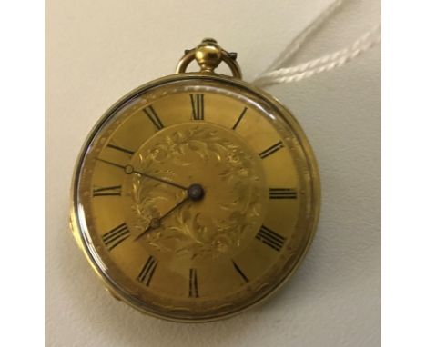 A 9ct gold pocket watch movement marked Tissot