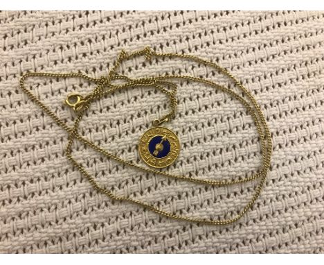 An 18ct Zodiac pendant on chain