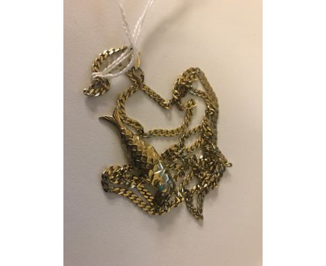 A 9ct articulated fish pendant on a 9ct chain