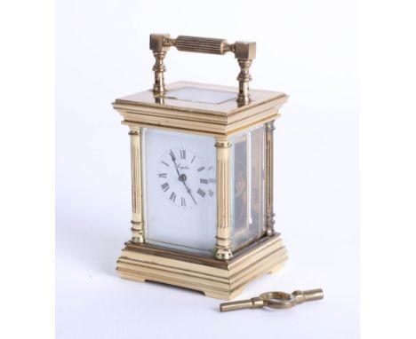 L'Epee a miniature French brass case carriage clock with key.