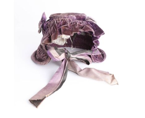 A Victorian velvet bonnet reputedly to have been owned by the Royal Family. In the middle1800s a nursemaid to the Royal house