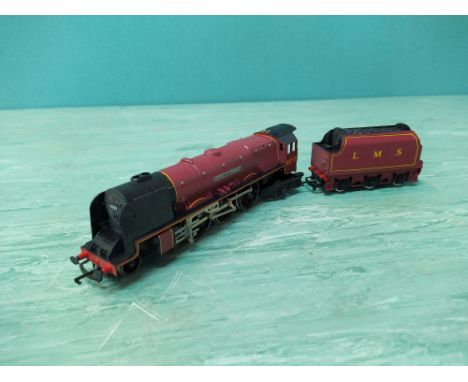 A boxed Hornby R697 LMS Express passenger set including engine and coaches, track etc (box lacking film front and some conten