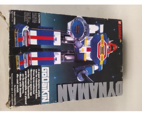 A vintage 'Godaikin' Dynaman early Transformer robot (assorted cards missing from box and cover worn)
