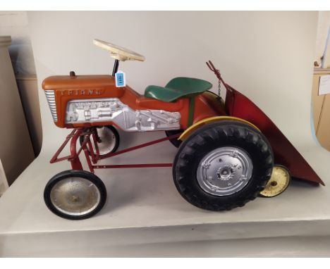 A 1960's Triang metal and plastic ride on tractor with trailer, approx 50" long (missing back loop to attach trailer)