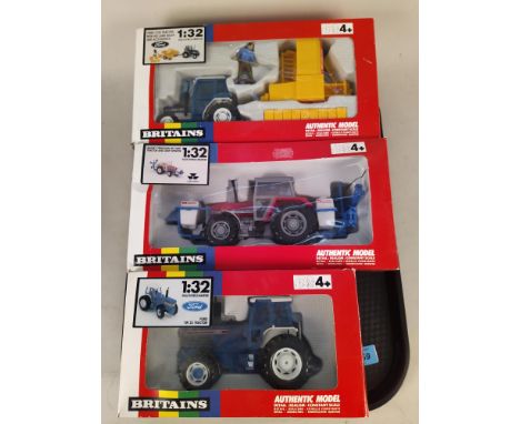 Three boxed Britains 1:32 scale models including 9508 Ford TW25 tractor, 9607 Massey Ferguson tractor and crop sprayer and 96