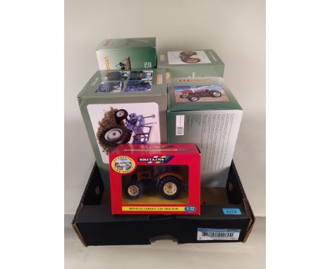 Four Universal Hobbies boxed tractors including tractor/plough, two Ford, Massey and a Britains Renault Cergos 340