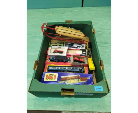 Various Hornby Dublo and HO international train carriages and accessories plus a small selection of cars and a sled
